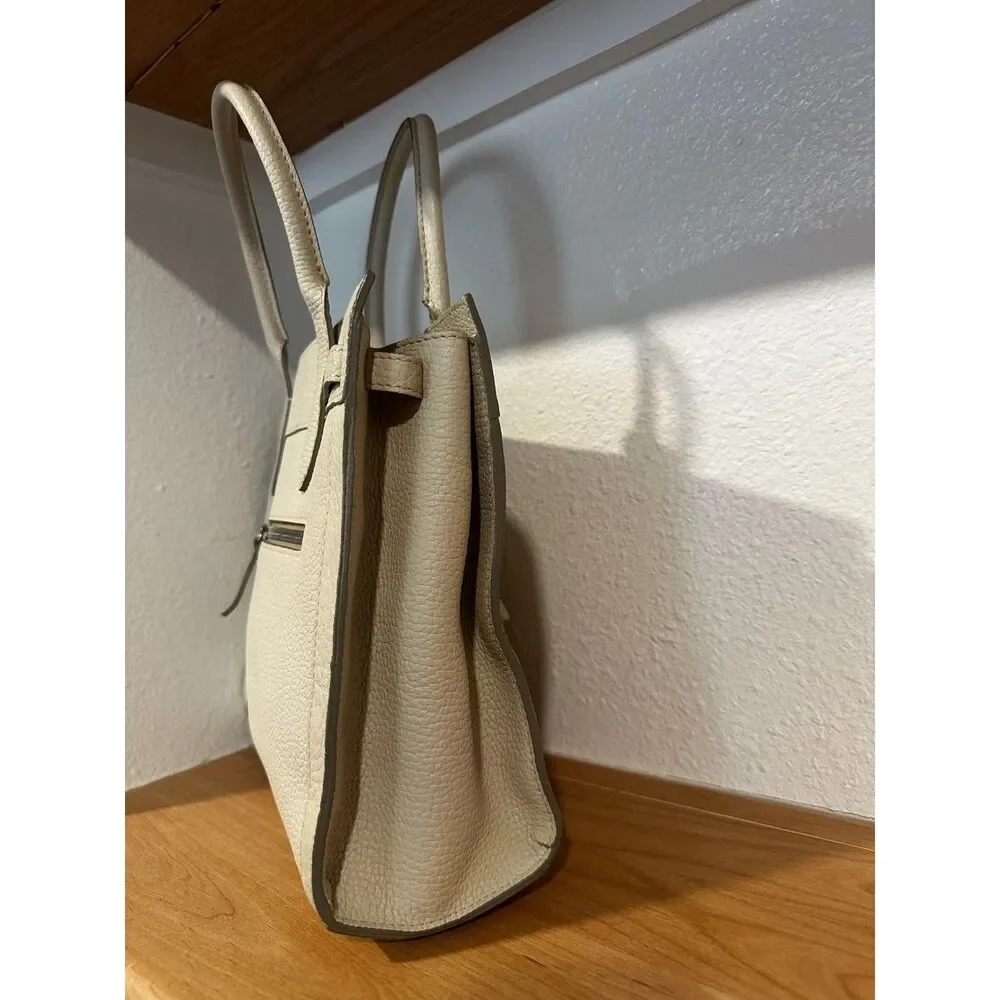 Dooney & Bourke East West Tassel Purse Bone EUC